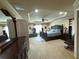 Spacious main bedroom with tray ceilings, ceiling fan, and ample natural light at 545 Eldridge Dr, Suwanee, GA 30024