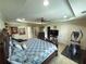 Spacious main bedroom with tray ceilings, a ceiling fan, and comfortable carpet at 545 Eldridge Dr, Suwanee, GA 30024