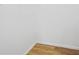 Empty corner closet with white walls and wood-look flooring at 901 Gettysburg Pl, Atlanta, GA 30350