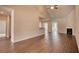 Bright and airy living space with hardwood floors, fireplace, and vaulted ceiling at 911 Park Place St, Social Circle, GA 30025