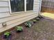 Landscaped backyard featuring a variety of plantings along the house at 269 Privet Cir, Suwanee, GA 30024