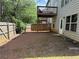 Home with private backyard, wooden fence, mature trees and deck at 269 Privet Cir, Suwanee, GA 30024