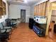 Unfinished basement area with wood floors, ideal for customization and storage at 269 Privet Cir, Suwanee, GA 30024