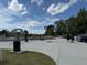 Picturesque view of the community area with paved walkways, green spaces, and ample parking for residents and visitors at 269 Privet Cir, Suwanee, GA 30024