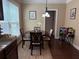 Bright dining area features a round table, four chairs, and natural light from a large window at 269 Privet Cir, Suwanee, GA 30024