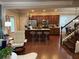Open kitchen with granite countertops, stainless steel appliances, and seating at the island at 269 Privet Cir, Suwanee, GA 30024