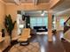 Cozy living room with hardwood floors, plush seating, and natural light from the large windows at 269 Privet Cir, Suwanee, GA 30024