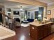 Spacious living room with hardwood floors, fireplace, and modern furnishings at 269 Privet Cir, Suwanee, GA 30024