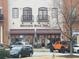 Brown Bag Deli & Cafe with black awnings and a couple of vehicles out front at 269 Privet Cir, Suwanee, GA 30024