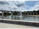 Inviting water feature and pedestrian bridge creating a focal point in the community's landscape and promoting outdoor enjoyment at 269 Privet Cir, Suwanee, GA 30024