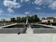 Stunning community water feature and sculpture with modern architecture, enhancing the area's appeal and providing a gathering spot at 269 Privet Cir, Suwanee, GA 30024