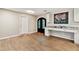 Inviting entryway features luxury vinyl plank flooring, intricate front door and granite countertop desk at 1675 Commonwealth Trl, Cumming, GA 30041