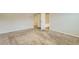 Bedroom featuring neutral paint and carpet floors, with a walk-in closet at 229 Prescott St, Locust Grove, GA 30248