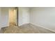 Bedroom with neutral walls and carpet flooring at 229 Prescott St, Locust Grove, GA 30248