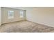 Bedroom with carpet flooring and neutral paint at 229 Prescott St, Locust Grove, GA 30248