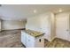 Spacious living room with wood-look flooring and recessed lighting at 229 Prescott St, Locust Grove, GA 30248