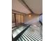 The balcony features sliding glass doors and sun shade at 3575 Oakvale Road # 303, Decatur, GA 30034