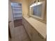 Bathroom featuring double sinks and tile floors at 3575 Oakvale Road # 303, Decatur, GA 30034