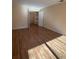 Bedroom with wood floors and a large closet for ample storage at 3575 Oakvale Road # 303, Decatur, GA 30034