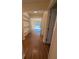 Hallway with hardwood floors and built in shelves at 3575 Oakvale Road # 303, Decatur, GA 30034