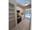 Bright kitchen showcases white cabinetry, stainless steel appliances, and tile flooring at 3575 Oakvale Road # 303, Decatur, GA 30034