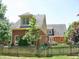A well-maintained backyard with a wooden fence and lush greenery surrounding the property at 3592 Galdway Dr, Snellville, GA 30039