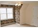 Bedroom showcases a patterned wallpaper and a window at 3592 Galdway Dr, Snellville, GA 30039