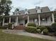 Charming single Gathering home featuring a wide front porch and well manicured front yard and inviting curb appeal at 3592 Galdway Dr, Snellville, GA 30039
