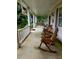 Inviting front porch with rocking chairs and comfortable seating, perfect for enjoying the outdoors at 3592 Galdway Dr, Snellville, GA 30039