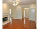 Cozy living room featuring a fireplace and hardwood floors at 3592 Galdway Dr, Snellville, GA 30039