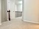 Hallway with view of wooden railing and a carpeted floor at 5872 Oakbrook Lake Ct, Norcross, GA 30093