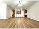 A spacious living room features new floors and lots of natural light at 5872 Oakbrook Lake Ct, Norcross, GA 30093