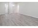 Spacious bedroom with light grey flooring and neutral walls at 11433 Panhandle Rd, Hampton, GA 30228