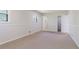 Spacious bedroom with neutral carpet, fresh paint, and a bright airy feel at 11433 Panhandle Rd, Hampton, GA 30228