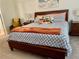 Spacious bedroom showcasing a stylish bed, decor, and a comfortable seating area at 431 Crested View Dr, Loganville, GA 30052