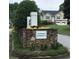 Covenant Community sign with stone base and manicured landscaping, adding curb appeal to the neighborhood entrance at 431 Crested View Dr, Loganville, GA 30052