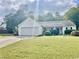 Charming one-story home with a well-manicured lawn and a two-car garage at 431 Crested View Dr, Loganville, GA 30052