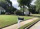 Home's front yard with mailbox and green lawn at 431 Crested View Dr, Loganville, GA 30052