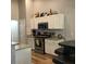 Kitchen featuring white cabinets, stainless steel appliances and granite countertops at 431 Crested View Dr, Loganville, GA 30052
