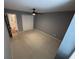 Bedroom with bathroom, modern ceiling fan and spacious closet space at 504 Radford Ct, Woodstock, GA 30188
