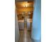 Laundry room features a washer, a dryer, wire rack shelving, and tile flooring at 504 Radford Ct, Woodstock, GA 30188