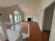 Spacious living room with high ceilings, a fireplace, and large windows offering natural light at 504 Radford Ct, Woodstock, GA 30188