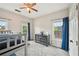 Neutral bedroom featuring a set of bunk beds, a dresser, and a bright window at 75 Vinings Lake Sw Dr, Mableton, GA 30126