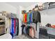 Organized walk-in closet with ample storage space, featuring shelves and rods for clothing and accessories at 75 Vinings Lake Sw Dr, Mableton, GA 30126