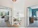 Hallway showcasing views into the main bedroom and another bedroom, highlighting the home's open layout at 75 Vinings Lake Sw Dr, Mableton, GA 30126