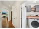 Laundry room features a washer and dryer and wood countertops with grey cabinets at 75 Vinings Lake Sw Dr, Mableton, GA 30126