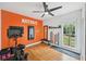 Bright home gym with exercise equipment, a large mirror and natural light from the window at 75 Vinings Lake Sw Dr, Mableton, GA 30126