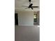 Spacious bedroom features plush carpet and an ensuite bath at 3036 Zodiac Ct, Lawrenceville, GA 30044