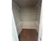 An empty walk-in closet with wire shelving and neutral carpeting at 3036 Zodiac Ct, Lawrenceville, GA 30044