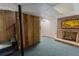Basement offers an unfinished space with a charming brick fireplace ready to be transformed to your liking at 3560 Emily Way, Atlanta, GA 30349